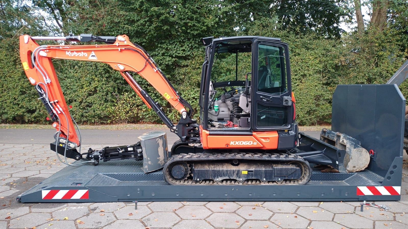 Abrollplattform für Maschinen Tiefbett Baggertransport Abrollcontainer